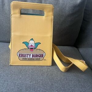 Cakeworthy X Simpsons Capsule
Krusty Burger Happy Meal Bag